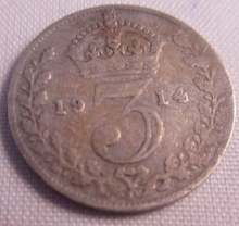 Load image into Gallery viewer, 1914 KING GEORGE V BARE HEAD .925 SILVER 3d THREE PENCE COIN IN CLEAR FLIP
