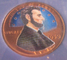 Load image into Gallery viewer, LINCOLN KENNEDY STRANGE BUT TRUE 4 COIN SET WITH STAMPS ON CARD IN SEALED PACK
