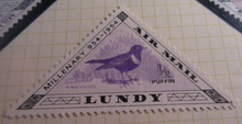 Load image into Gallery viewer, VARIOUS LUNDY ISLAND AIRMAIL PUFFIN STAMPS MNH IN CLEAR FRONTED STAMP HOLDER
