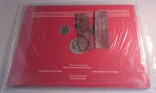 Load image into Gallery viewer, LINCOLN KENNEDY STRANGE BUT TRUE 4 COIN SET WITH STAMPS ON CARD IN SEALED PACK
