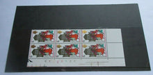 Load image into Gallery viewer, 1968 HAPPY CHRISTMAS BLOCK OF 6 9d STAMPS MNH WITH CLEAR FRONTED STAMP HOLDER
