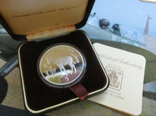 Load image into Gallery viewer, 1975 ROYAL MINT ZAIRE CONSERVATION OKAPI SILVER 5 ZAIRS COIN BOX/COA.
