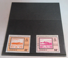 Load image into Gallery viewer, QEII JERSEY DECIMAL STAMPS 50TH ANNIV BLAMPIEDS OCCUPATION MNH IN STAMP HOLDER
