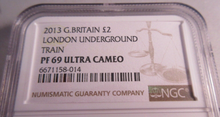 Load image into Gallery viewer, 2013 UK LONDON UNDERGROUND TRAIN PF69 ULTRA CAMEO NGC SLABBED COIN
