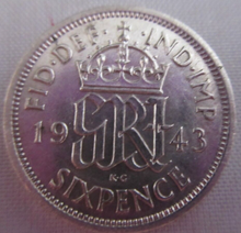 Load image into Gallery viewer, 1943 KING GEORGE VI BARE HEAD .500 SILVER UNC 6d SIXPENCE COIN IN CLEAR FLIP

