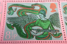 Load image into Gallery viewer, 1975 CHRISTMAS ANGEL WITH MANDOLIN  10 X 1/2P 8 X STAMPS MNH WITH STAMP HOLDER
