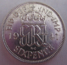 Load image into Gallery viewer, 1941 KING GEORGE VI BARE HEAD .500 SILVER UNC 6d SIXPENCE COIN IN CLEAR FLIP
