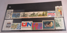 Load image into Gallery viewer, 1960&#39;s &amp; 1970&#39;s USA 13 X STAMPS MNH IN STAMP HOLDER
