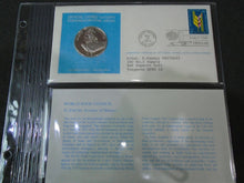 Load image into Gallery viewer, 1975 - 77 UNITED NATIONS OFFICIAL SILVER PROOF MEDAL COVER WITH STAMPS IN SLEAVE
