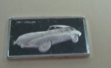 Load image into Gallery viewer, 1961 JAGUAR 15mm X 10mm 1.60gram SILVER INGOT WITH INFORMATION SLIP
