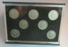 Load image into Gallery viewer, FLORIN SET OF SEVEN SILVER COINS IN CLEAR HARD CASE &amp; ROYAL MINT BLUE BOOK
