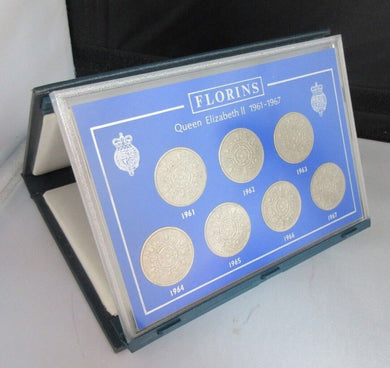 1961-1967 QUEEN ELIZABETH II FLORINS BUNC 7 COIN SET IN ROYAL MINT BLUE BOOK