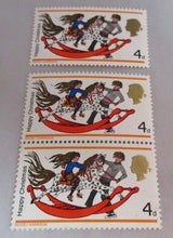 Load image into Gallery viewer, VARIOUS CHRISTMAS STAMPS X 13 MNH 1968 &amp; 1969 IN CLEAR FRONTED STAMP HOLDER
