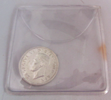 Load image into Gallery viewer, 1943 KING GEORGE VI BARE HEAD .500 SILVER UNC 6d SIXPENCE COIN IN CLEAR FLIP
