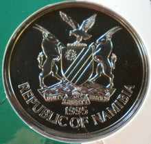 Load image into Gallery viewer, 1945-1995 NATIONS UNITED FOR PEACE NAMIBIA $10 COMMEMORATIVE COIN &amp;INFO CARD
