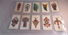 Load image into Gallery viewer, WILLS CIGARETTE CARDS LUCKY CHARMS COMPLETE SET OF 50 IN CLEAR PLASTIC PAGES
