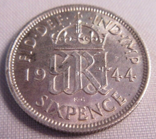 Load image into Gallery viewer, 1944 KING GEORGE VI BARE HEAD .500 SILVER UNC 6d SIXPENCE COIN IN CLEAR FLIP
