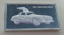 Load image into Gallery viewer, 1954 MERCEDES BENZ 15mm X 10mm 1.60gram SILVER INGOT WITH INFORMATION SLIP
