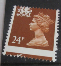 Load image into Gallery viewer, MISPERFORATED QUEEN ELIZABETH II 24P STAMP WITH CLEAR FRONTED STAMP HOLDER
