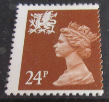 Load image into Gallery viewer, MISPERFORATED QUEEN ELIZABETH II 24P STAMP WITH CLEAR FRONTED STAMP HOLDER
