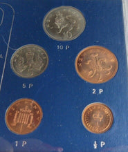 Load image into Gallery viewer, BRITAINS FIRST DECIMAL 5 COIN SET IN CLEAR HARD CASE &amp; ROYAL MINT BLUE BOOK
