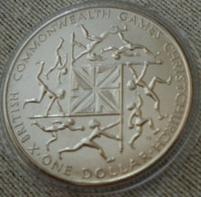 Load image into Gallery viewer, 1974 Xth BRITISH COMMONWEALTH GAMES NEW ZEALAND ONE DOLLAR CROWN COIN IN CAPSULE
