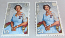 Load image into Gallery viewer, JERSEY QUEEN ELIZABETH II  £2 &amp; £1 STAMPS MNH IN A CLEAR FRONTED STAMP HOLDER
