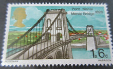 Load image into Gallery viewer, 1968 PORT MENAI BRIDGE 1s 6d 7 X STAMPS MNH IN CLEAR FRONTED STAMP HOLDER
