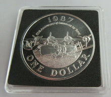 Load image into Gallery viewer, 1987 QEII BOAT PLANE BERMUDA SILVER BUNC $1 COIN BOX/COA VERY SCARCE COIN
