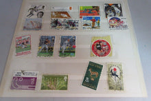 Load image into Gallery viewer, VARIOUS SPORTING AUSTRALIA &amp; OTHERS STAMPS WITH CLEAR FRONTED HOLDER
