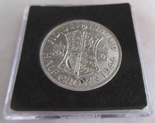 Load image into Gallery viewer, 1944 GEORGE VI BARE HEAD HALF CROWN .500 EF IN QUADRANT CAPSULE
