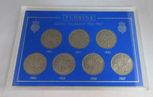 Load image into Gallery viewer, 1961-1967 QUEEN ELIZABETH II FLORINS BUNC 7 COIN SET IN ROYAL MINT BLUE BOOK
