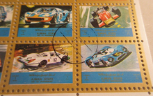 Load image into Gallery viewer, AJMAN STATE UNITED ARAB EMIRATES OLD AND MODERN CARS POSTAGE STAMPS IN HOLDER
